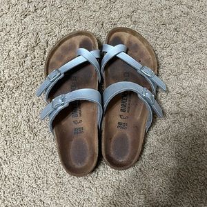 Silver Birkenstocks with toe hole